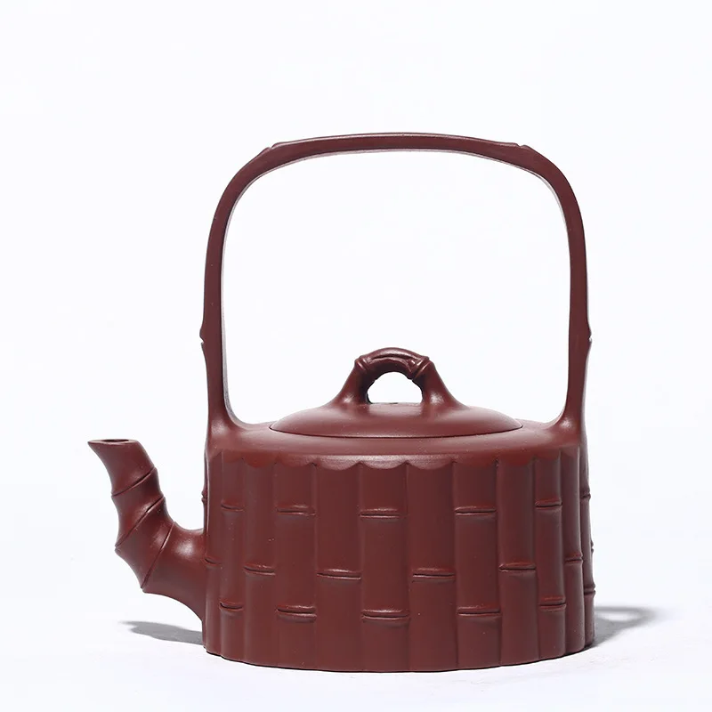 Yixing Dark-red Enameled Pottery Teapot Famous Manual Raw Ore Bright Red Robe Bamboo Joint Handle Infusion Of Tea Kettle
Yixing Dark-red Enameled Pottery Teapot Famous Manual Raw Ore Bright Red Robe Bamboo Joint Handle Infusion Of Tea Kettle