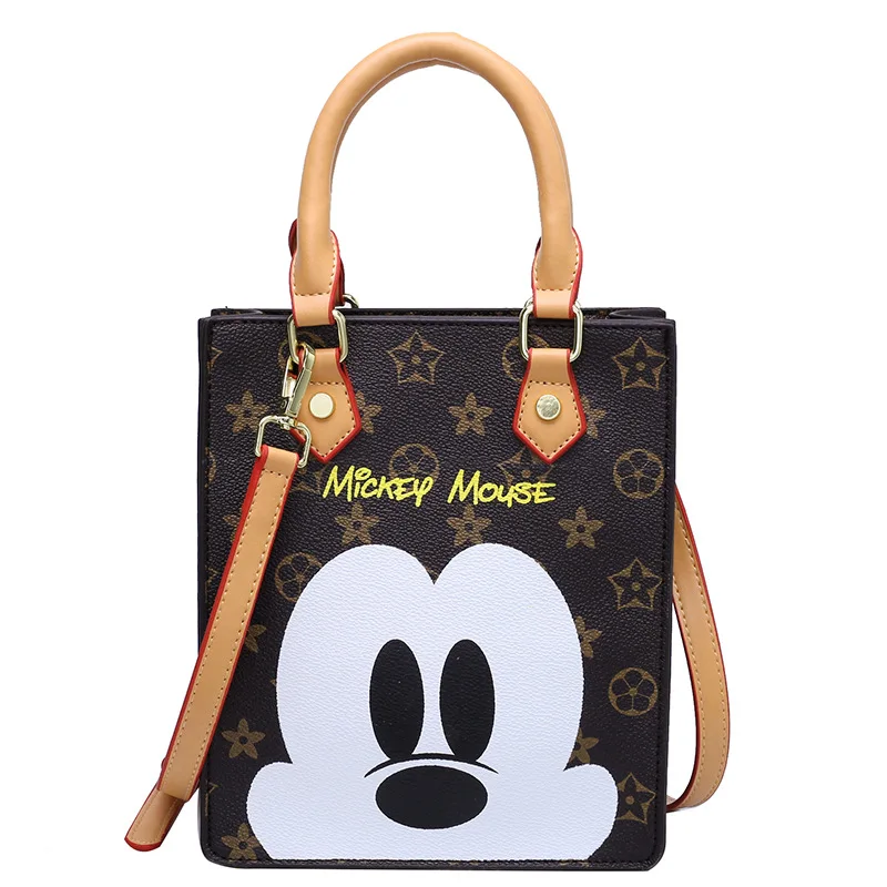 New2021 Disney cartoon printed women's bag shoulder bag messenger bag Mickey Mouse top handle bag evening bag women 
New2021 Disney cartoon printed women's bag shoulder bag messenger bag Mickey Mouse top handle bag evening bag women