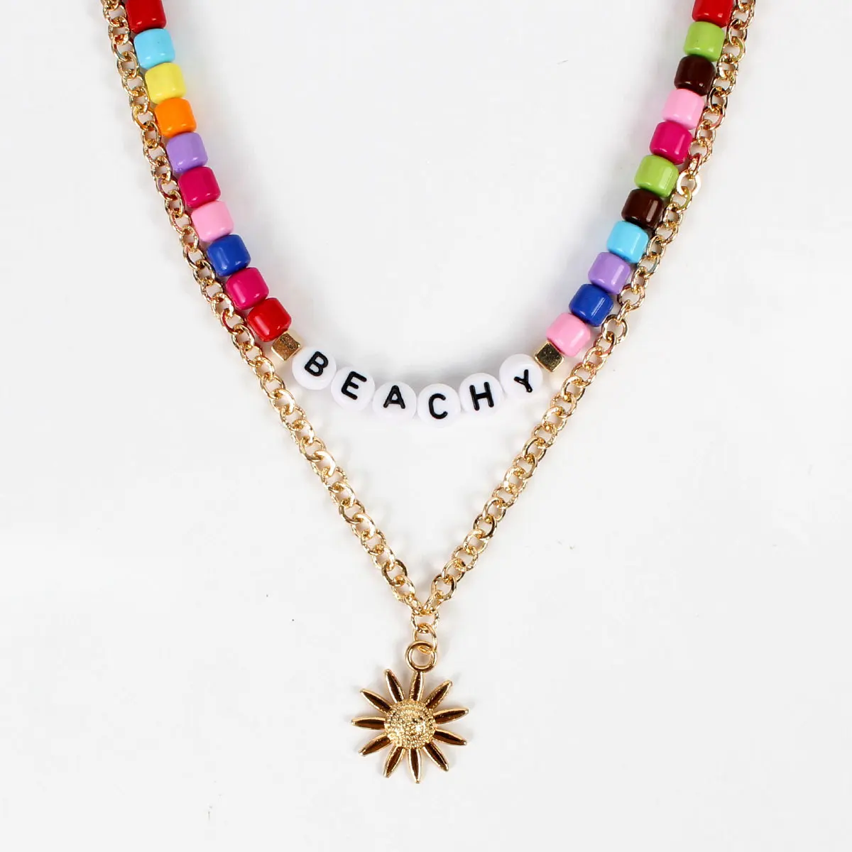 The European and American fashion color acrylic beads sunflower alloy pendant necklace fashion jewelry wholesale
The European and American fashion color acrylic beads sunflower alloy pendant necklace fashion jewelry wholesale