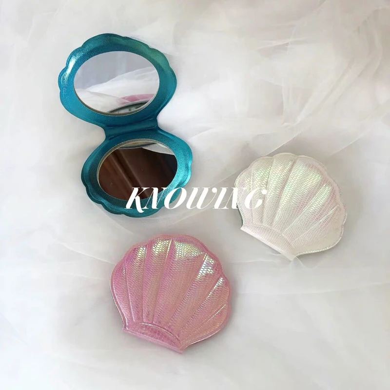 Mini Shell Makeup Mirror Compact Pocket Mirror Portable Double-Sided Folding Cosmetic Mirror Gifts Ins wind shooting decorations
Mini Shell Makeup Mirror Compact Pocket Mirror Portable Double-Sided Folding Cosmetic Mirror Gifts Ins wind shooting decorations