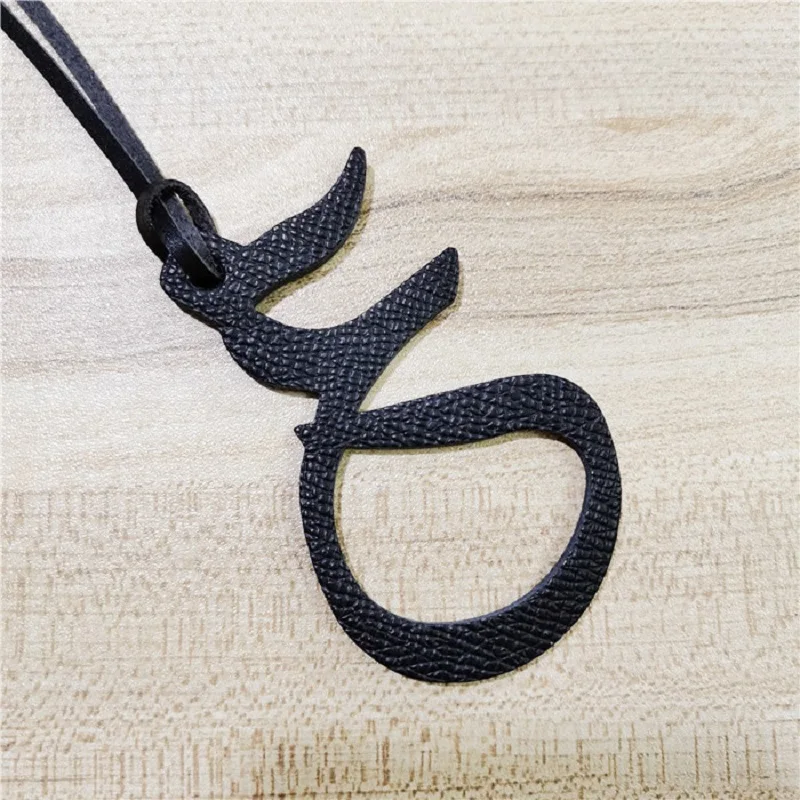 Wholesale Custom Made Genuine Natural Leather Character Alphabet Arabic Letter Keychain Backpack Pendant Ladies Women Bag Charm 
Wholesale Custom Made Genuine Natural Leather Character Alphabet Arabic Letter Keychain Backpack Pendant Ladies Women Bag Charm