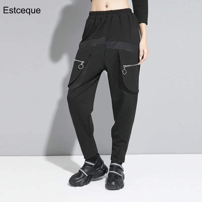 Spring and summer new women's casual cargo pants elastic iron ring zipper pocket harem pants
Spring and summer new women's casual cargo pants elastic iron ring zipper pocket harem pants