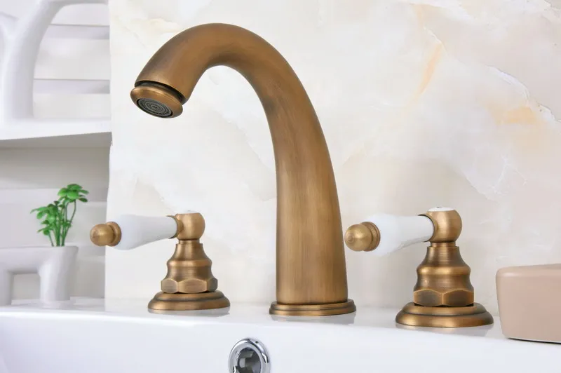 Antique Brass Finish Dual Ceramic Handle Widespread Bathroom Sink Faucet Deck Mounted Basin 3 Holes Mixer Taps Lan078 
Antique Brass Finish Dual Ceramic Handle Widespread Bathroom Sink Faucet Deck Mounted Basin 3 Holes Mixer Taps Lan078