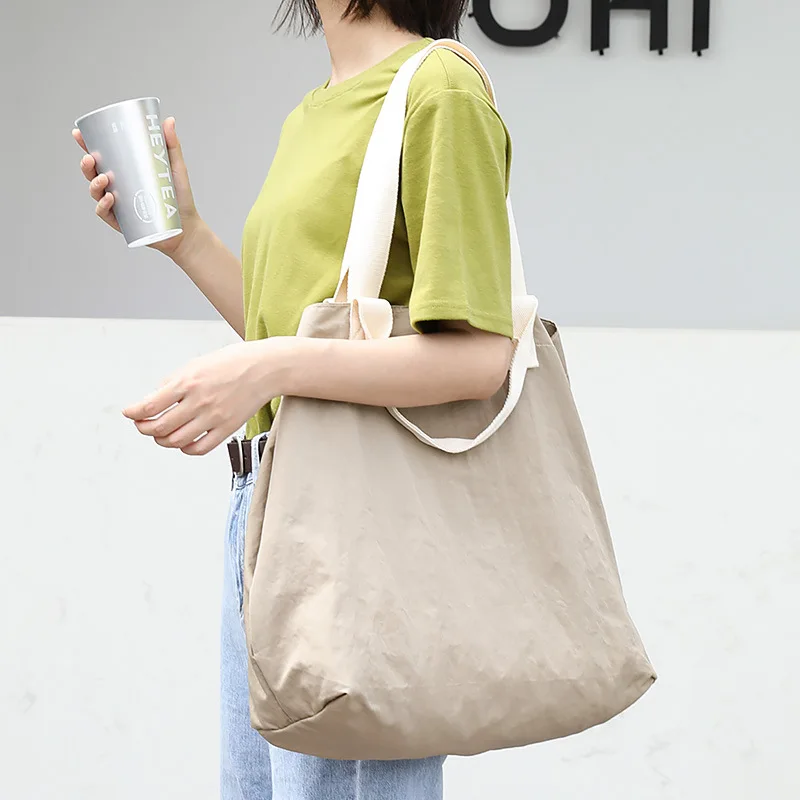 Large Capacity Leisure Handbag Simple Series Canvas Bag Fashion Nylon Shoulder Bag Women's Bag Shoppers Bag Tote Bag
Large Capacity Leisure Handbag Simple Series Canvas Bag Fashion Nylon Shoulder Bag Women's Bag Shoppers Bag Tote Bag