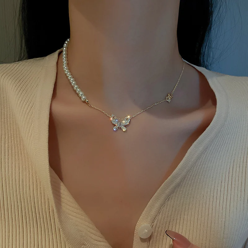Plated Korean fashion simple necklace pearl micro-inset zircon butterfly choker web celebrity temperament design collar
Plated Korean fashion simple necklace pearl micro-inset zircon butterfly choker web celebrity temperament design collar