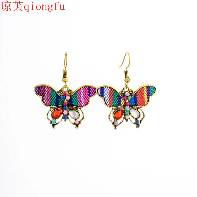 de mujer modernos 2021 Bohemian ethnic style diamond retro earrings European and American retro fabric butterfly half moon 
de mujer modernos 2021 Bohemian ethnic style diamond retro earrings European and American retro fabric butterfly half moon