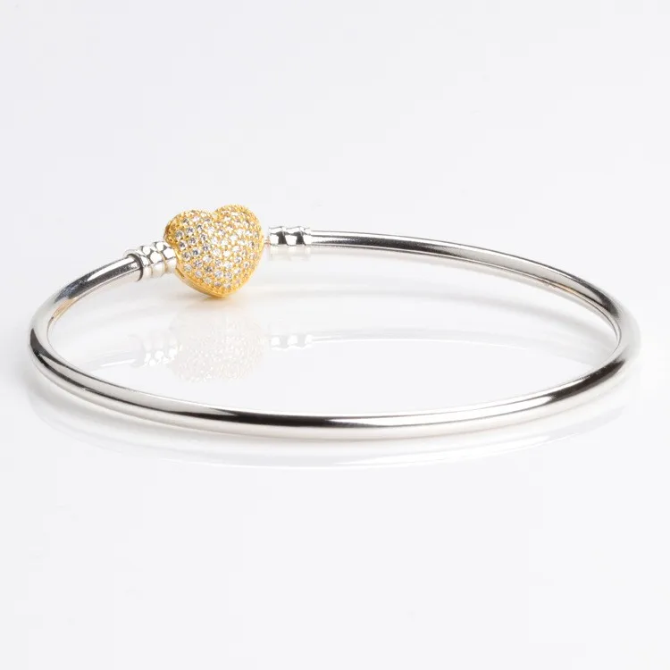 100% 925 Sterling Silver Pan Bracelet Golden Heart With Crystal Button Pan Bracelet Fit European Charm Bracelets Women Jewelry
100% 925 Sterling Silver Pan Bracelet Golden Heart With Crystal Button Pan Bracelet Fit European Charm Bracelets Women Jewelry