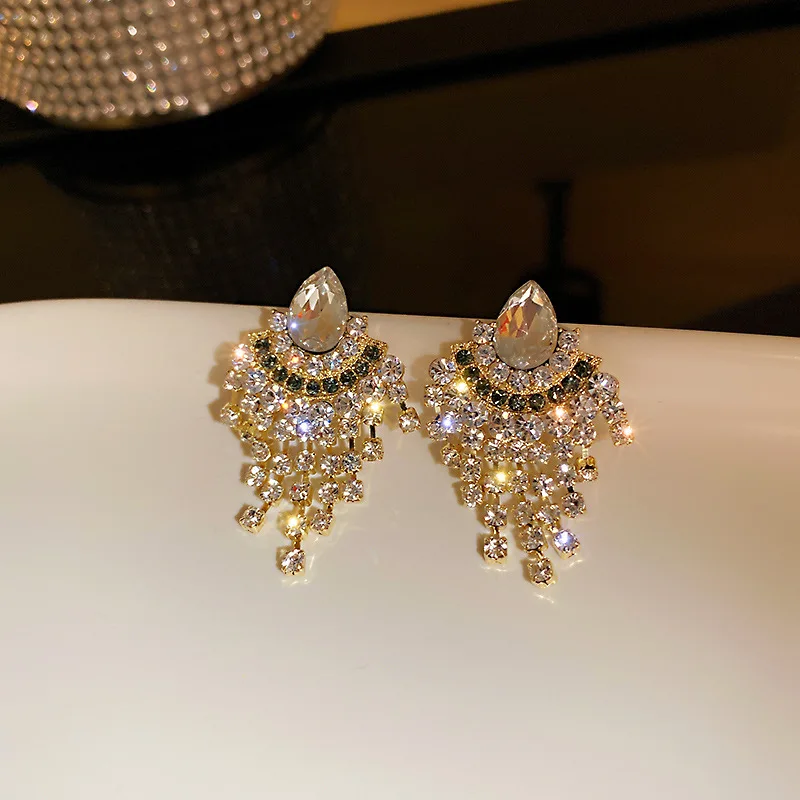 925 Silver Needle Korean Fashion Full Diamond Personalized Temperament Design Tide Drop Tassel Earrings Female 
925 Silver Needle Korean Fashion Full Diamond Personalized Temperament Design Tide Drop Tassel Earrings Female