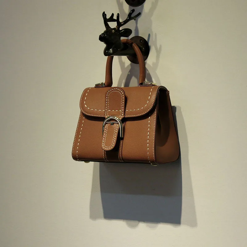 2020 new trendy car stitching portable imported leather saddle bag shoulder commuter female bag
2020 new trendy car stitching portable imported leather saddle bag shoulder commuter female bag