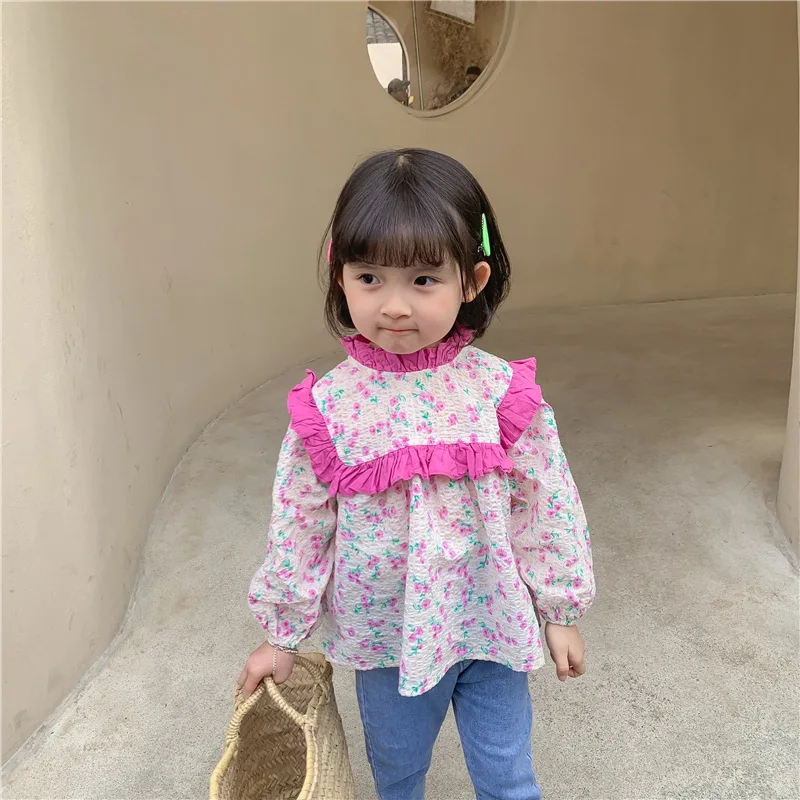 Children's Clothing 2021 Spring Girl Korean Floral Doll Shirt Female Treasure Korean Stand-Up Collar Shirt Baby Top Clothes
Children's Clothing 2021 Spring Girl Korean Floral Doll Shirt Female Treasure Korean Stand-Up Collar Shirt Baby Top Clothes