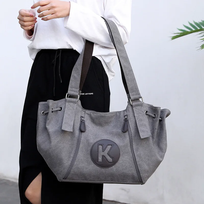 Canvas shoulder big bag female 2021 new Messenger bag casual wild ladies bag big capacity handbag ladies bag
Canvas shoulder big bag female 2021 new Messenger bag casual wild ladies bag big capacity handbag ladies bag