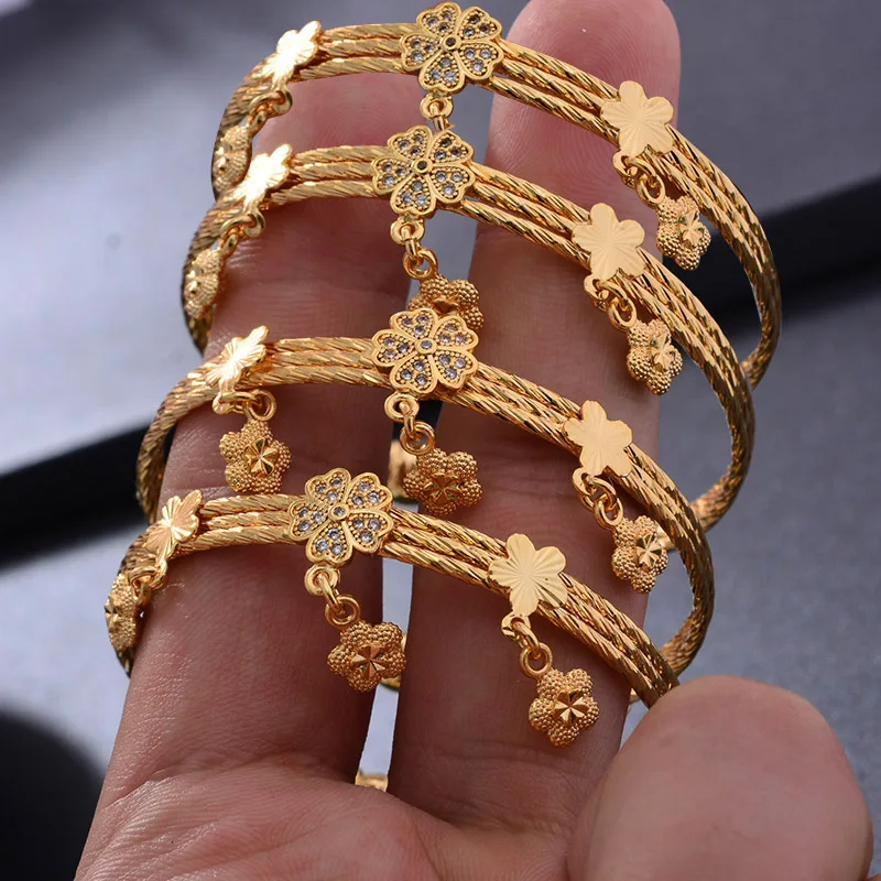 4pcs/lot Classic Lucky Baby Newbaby Gold Color Kids Adjustable Flower Bell Tassel Bangle Bracelet Best Children Gifts
4pcs/lot Classic Lucky Baby Newbaby Gold Color Kids Adjustable Flower Bell Tassel Bangle Bracelet Best Children Gifts