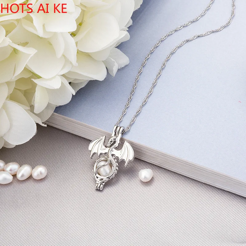 Women luminous necklaces Glow In The Dark Flying dragon stone cage pendant necklace For Ladies Fashion Jewelry Accessories
Women luminous necklaces Glow In The Dark Flying dragon stone cage pendant necklace For Ladies Fashion Jewelry Accessories