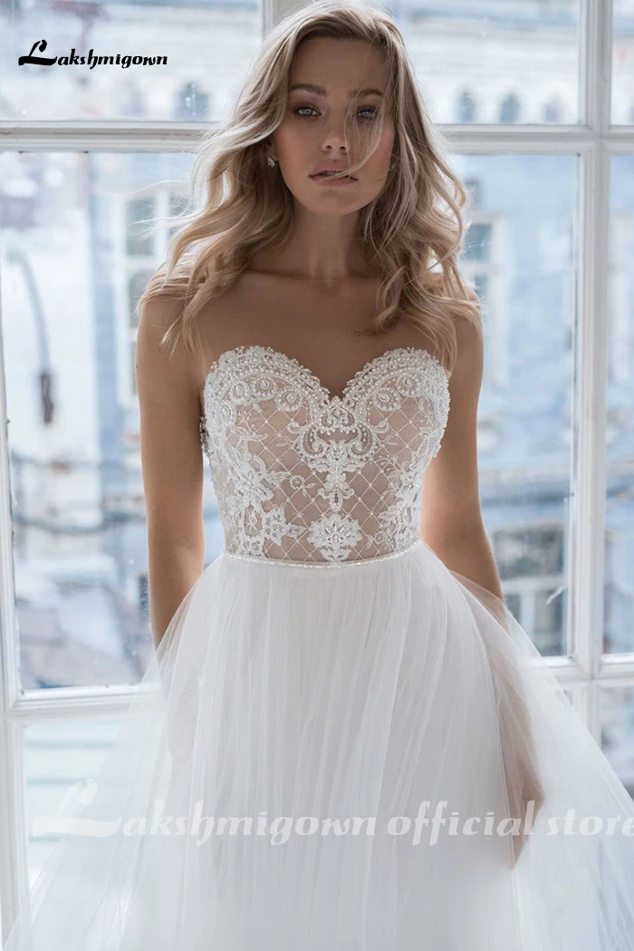 Lakshmigown Wedding Dresses Vestido De Novia Sweetheart Sheer Strap Pearls Applique Bridal Wedding Gowns Robe De Mariage
Lakshmigown Wedding Dresses Vestido De Novia Sweetheart Sheer Strap Pearls Applique Bridal Wedding Gowns Robe De Mariage