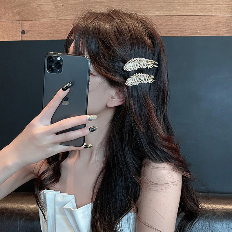 Feather pearl set diamond hair clip simple hair accessories South Korean temperament net red fashion side clip exaggerated femal
Feather pearl set diamond hair clip simple hair accessories South Korean temperament net red fashion side clip exaggerated femal