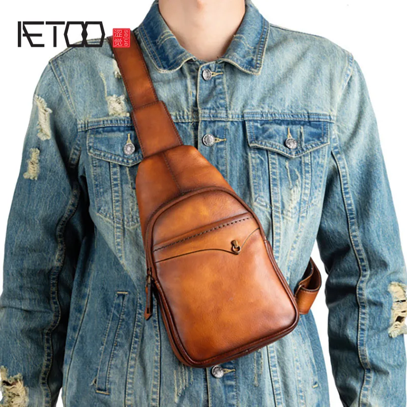 AETOO Men's leather fashion chest bag, leather men's messenger bag, first layer cowhide casual men's bag
AETOO Men's leather fashion chest bag, leather men's messenger bag, first layer cowhide casual men's bag