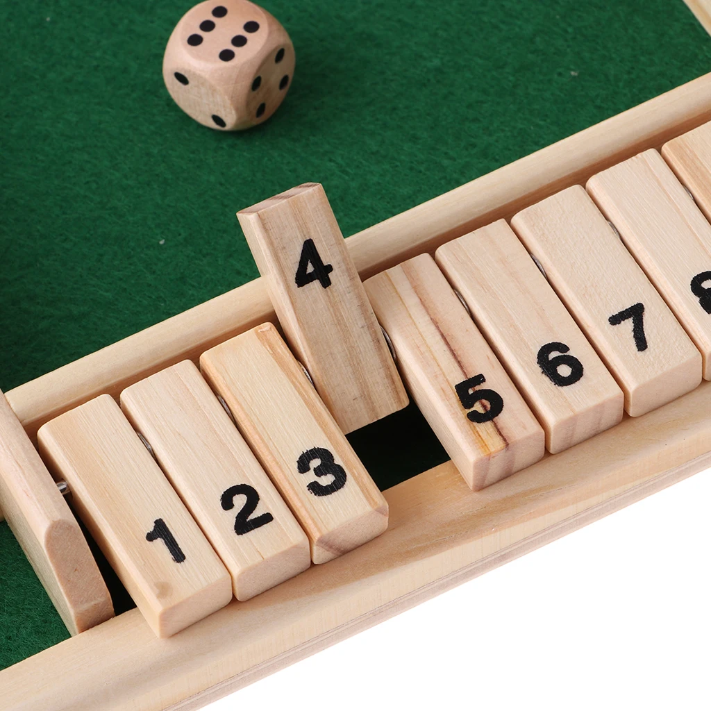 Shut the Box, Party Game Roll the dice and lay down any numerical combination of tiles that match your roll
Shut the Box, Party Game Roll the dice and lay down any numerical combination of tiles that match your roll
