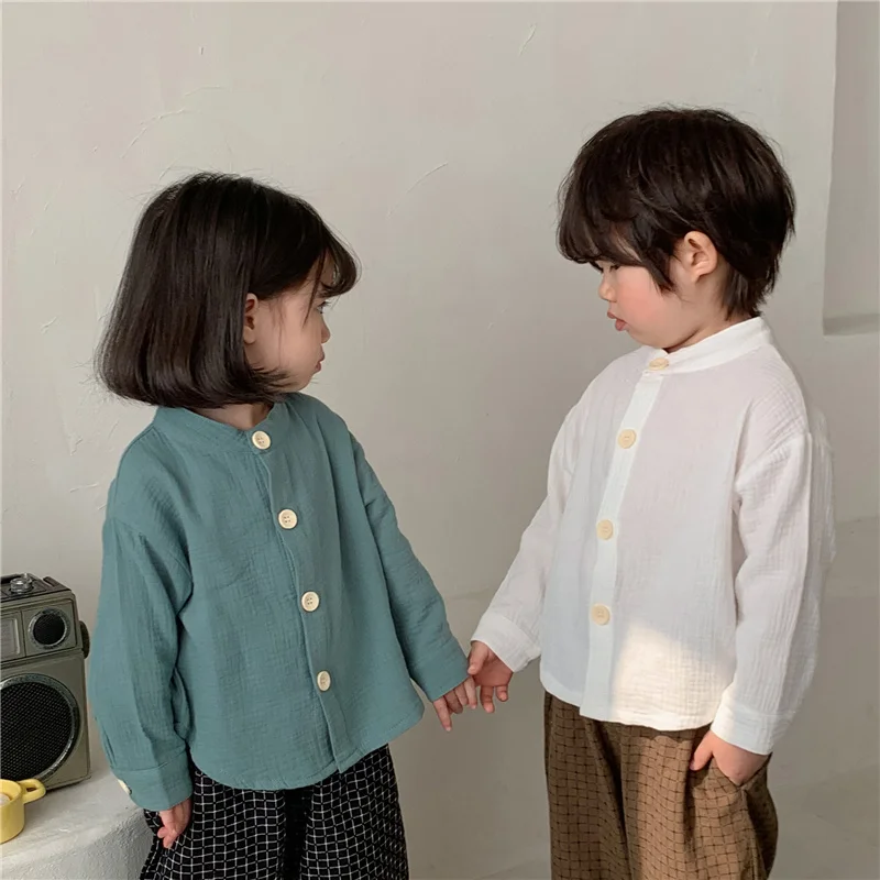 Spring 2022 Boys Solid Color Shirts Korean style Baby Girls Cotton Linen Long Sleeve Shirts Children Tops Clothing
Spring 2022 Boys Solid Color Shirts Korean style Baby Girls Cotton Linen Long Sleeve Shirts Children Tops Clothing