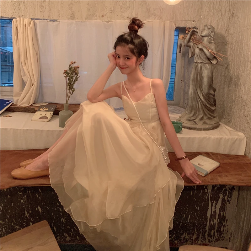 French Temperament Irregular Suspender Dress Female Summer Design Sense Niche Sweet Super Fairy Forest Fairy Net Skirt
French Temperament Irregular Suspender Dress Female Summer Design Sense Niche Sweet Super Fairy Forest Fairy Net Skirt