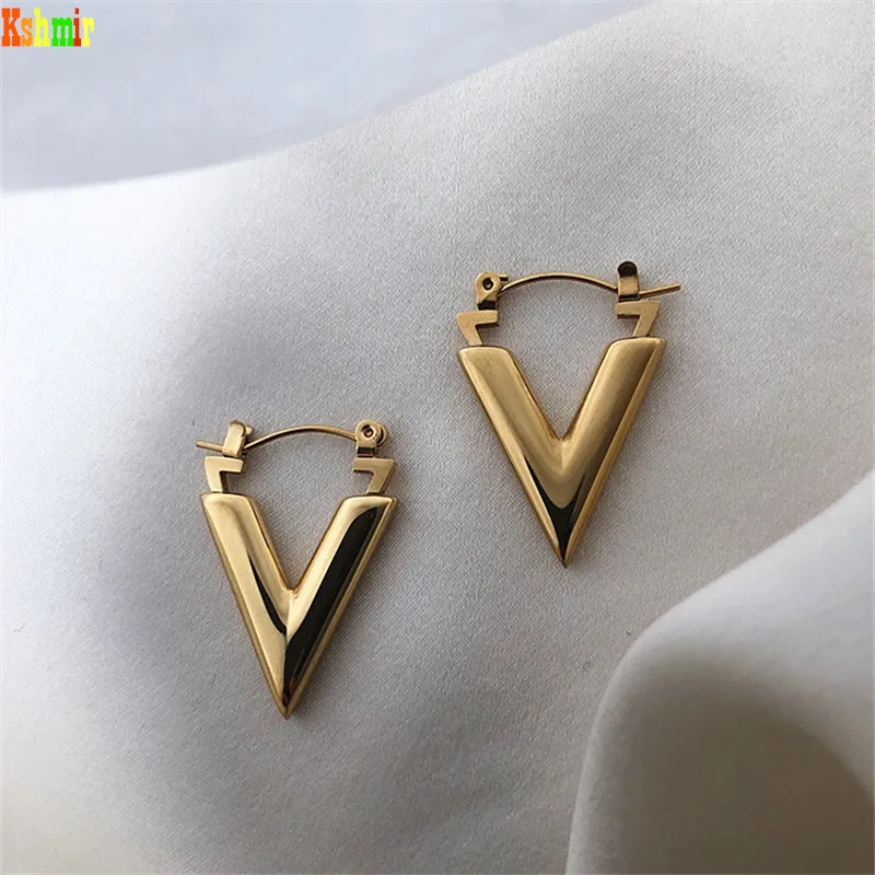 Kshmir New Korean edition retro gold metal letter V geometric triangle punk earrings for women jewelry gift 2021
Kshmir New Korean edition retro gold metal letter V geometric triangle punk earrings for women jewelry gift 2021