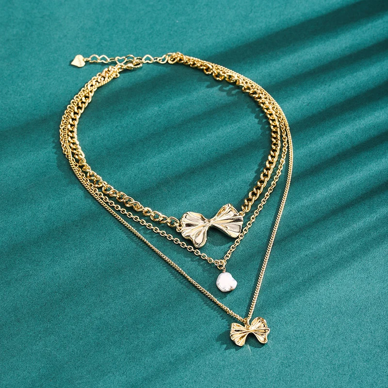 Dorado New Natural Pearl Necklace For Women Delicate Layered Pendant Metal Chain Bowknot Punk Personality Short Chain Party Gift
Dorado New Natural Pearl Necklace For Women Delicate Layered Pendant Metal Chain Bowknot Punk Personality Short Chain Party Gift