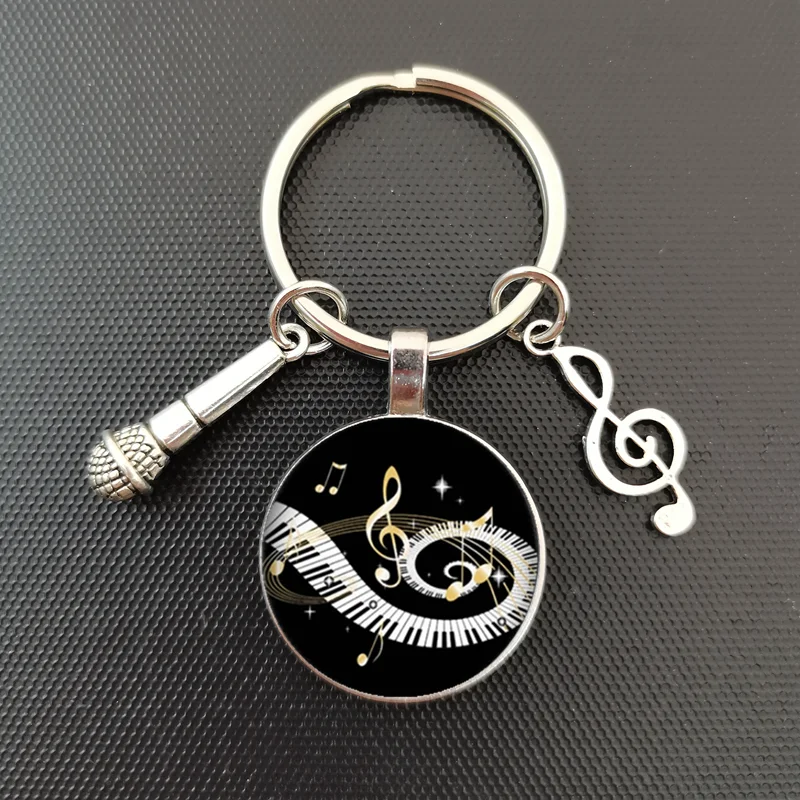 2021 new heart-shaped piano love pendant round glass keychain convex piano keyboard glass dome demo keychain jewelry
2021 new heart-shaped piano love pendant round glass keychain convex piano keyboard glass dome demo keychain jewelry