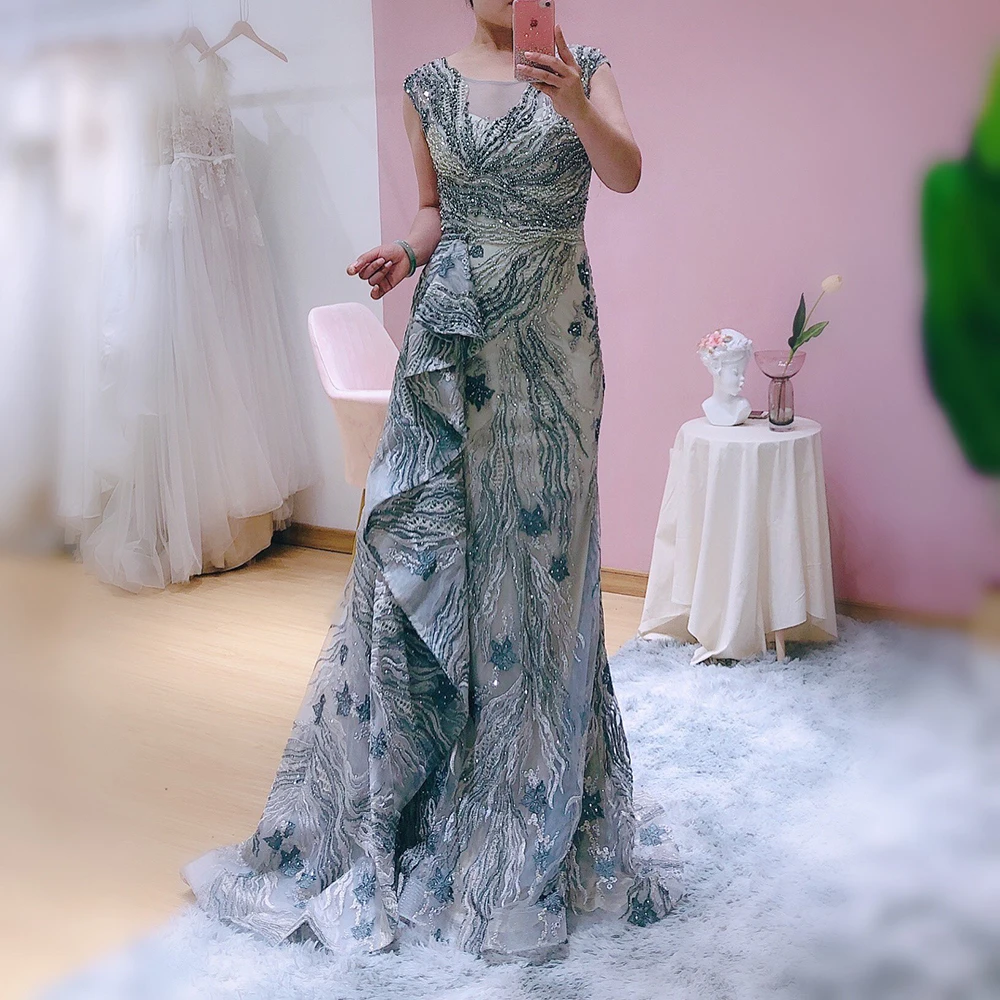 YILIBER Pink short sleeve handmade flowers sexy evening dresses 2021 dubai off shoulder crystal evening gowns real photo
YILIBER Pink short sleeve handmade flowers sexy evening dresses 2021 dubai off shoulder crystal evening gowns real photo