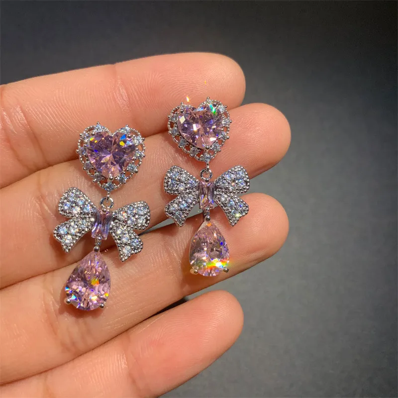 Sweet Heart Earrings Purple Crystal Bowtie Earrings New Fashion Water Drop Earring Brand Design Women Wedding Jewelry
Sweet Heart Earrings Purple Crystal Bowtie Earrings New Fashion Water Drop Earring Brand Design Women Wedding Jewelry