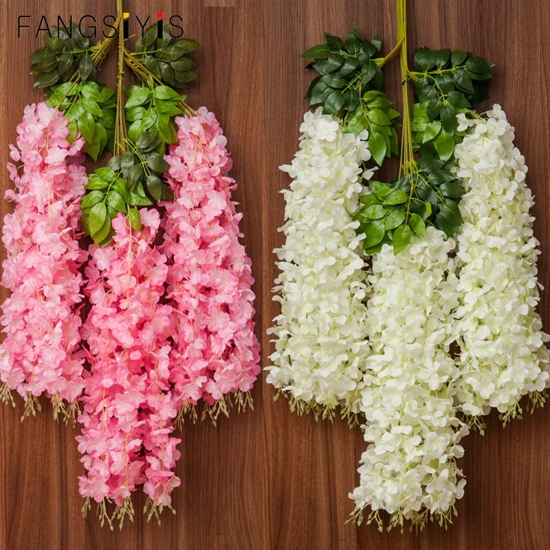 Artificial Silk Wisteria Vine Ratta Silk Hanging Flower Vine Wreath Wedding Fake Plant Leaf Rattan Trailing Fake Flower Ivy Wall
Artificial Silk Wisteria Vine Ratta Silk Hanging Flower Vine Wreath Wedding Fake Plant Leaf Rattan Trailing Fake Flower Ivy Wall