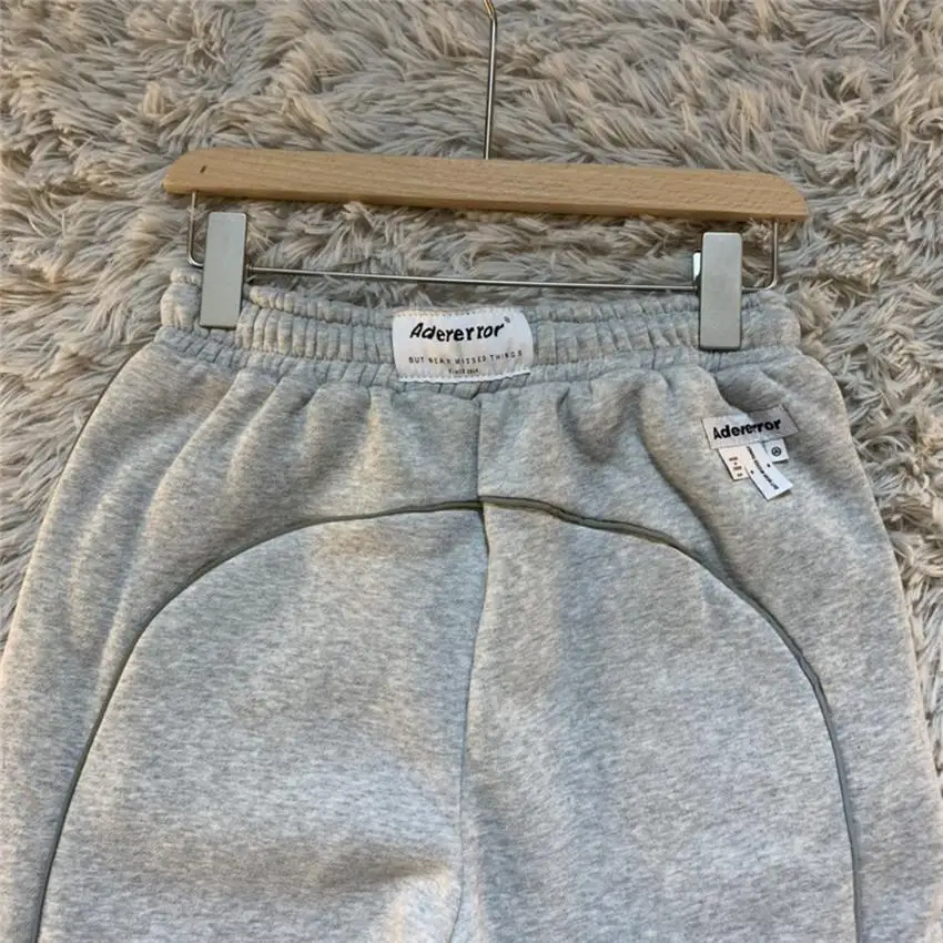 Embroidery ADER ERROR Pants Men Women Adererror Reflective Stripe Sweatpants ADER Marking Trousers mens clothing
Embroidery ADER ERROR Pants Men Women Adererror Reflective Stripe Sweatpants ADER Marking Trousers mens clothing