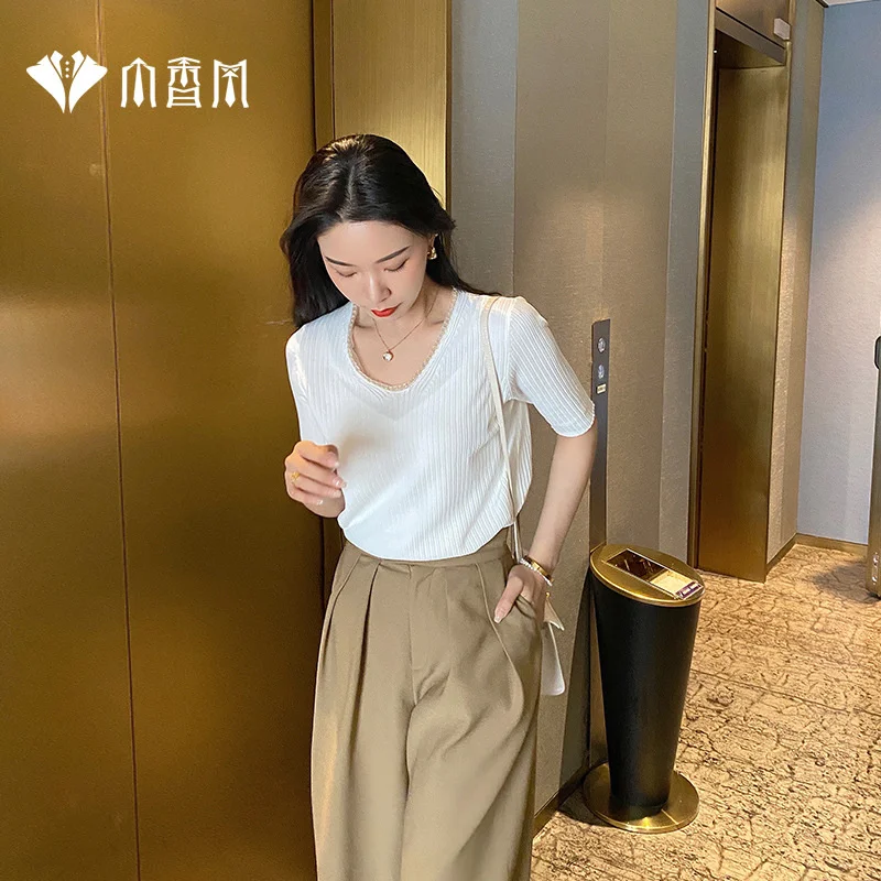 Xiaoxiangfeng T-shirt women's summer 2021 round ne nail bead sweater is thin, Korean version thin white ice silk top
Xiaoxiangfeng T-shirt women's summer 2021 round ne nail bead sweater is thin, Korean version thin white ice silk top