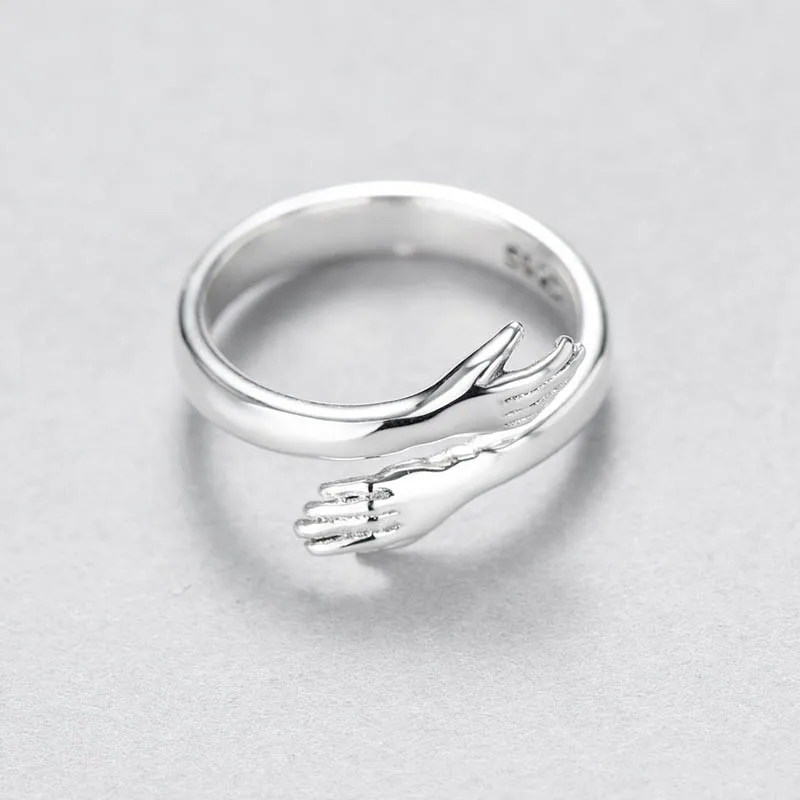 Hot Creative love embrace silver color ring fashion lady open ring jewelry gifts for lovers
Hot Creative love embrace silver color ring fashion lady open ring jewelry gifts for lovers