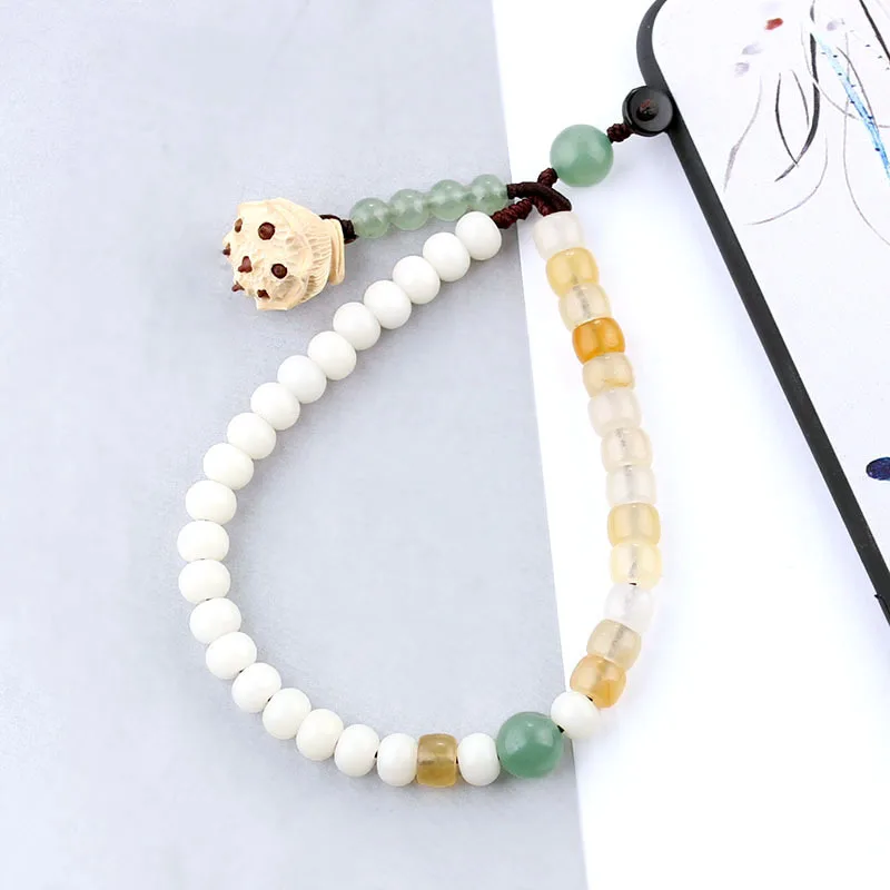 New short mobile phone pendant anti-lost rope bodhi golden silk jade mobile phone case lanyard female wrist mobile phone chain
New short mobile phone pendant anti-lost rope bodhi golden silk jade mobile phone case lanyard female wrist mobile phone chain