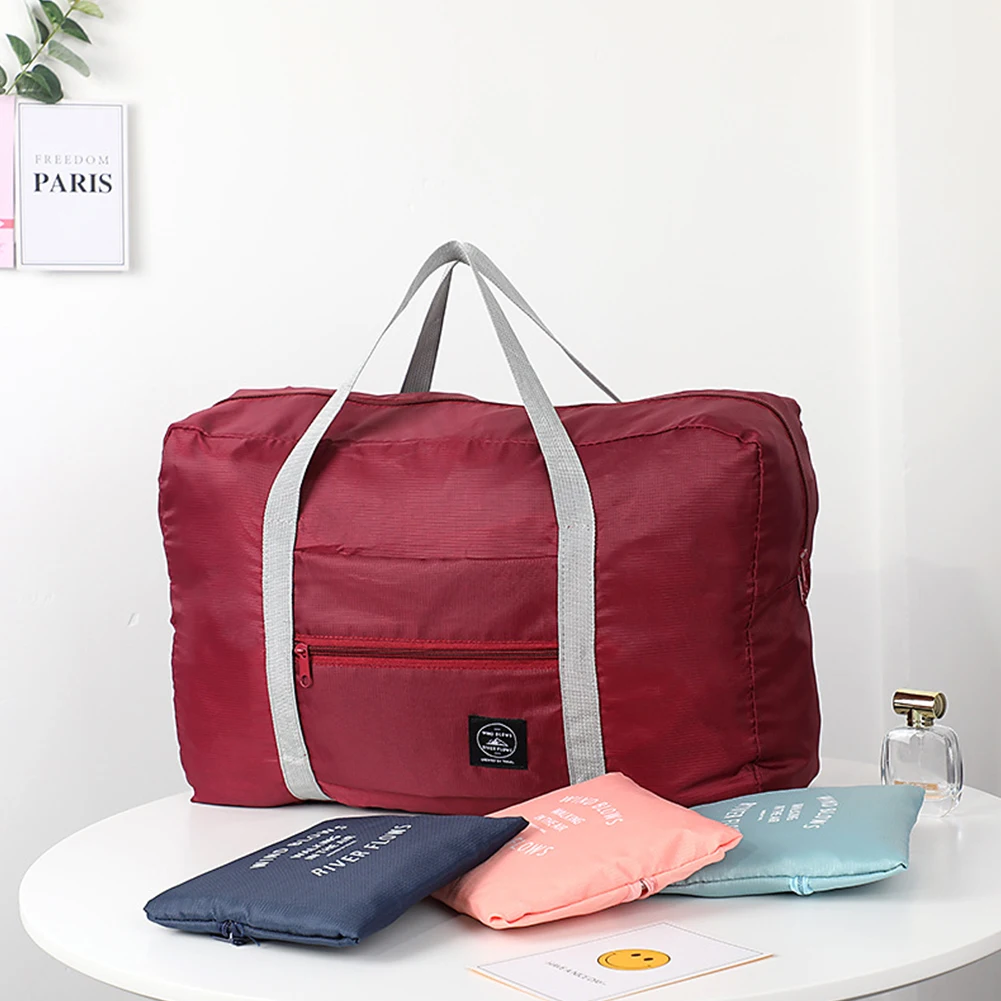 Foldable Travel Bags Women Solid Color Large Capacity Hand Bag Waterproof Luggage Storage Bag 2021 Women Men Gym Sports Bags
Foldable Travel Bags Women Solid Color Large Capacity Hand Bag Waterproof Luggage Storage Bag 2021 Women Men Gym Sports Bags