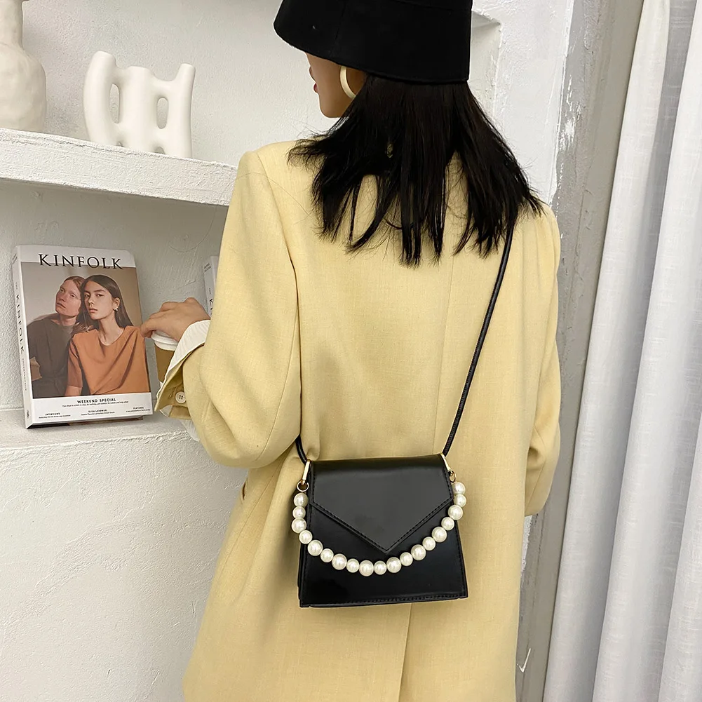 Pearl Shoulder Messenger Bag Solid Daily Crossbody Handbags PU Leather Women for Women PU Leather Female 2021 Bag
Pearl Shoulder Messenger Bag Solid Daily Crossbody Handbags PU Leather Women for Women PU Leather Female 2021 Bag