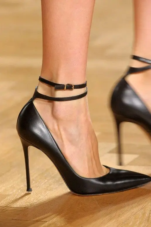 Simple high heeled shoes with solid pointed thin heel and one line buckle
Simple high heeled shoes with solid pointed thin heel and one line buckle