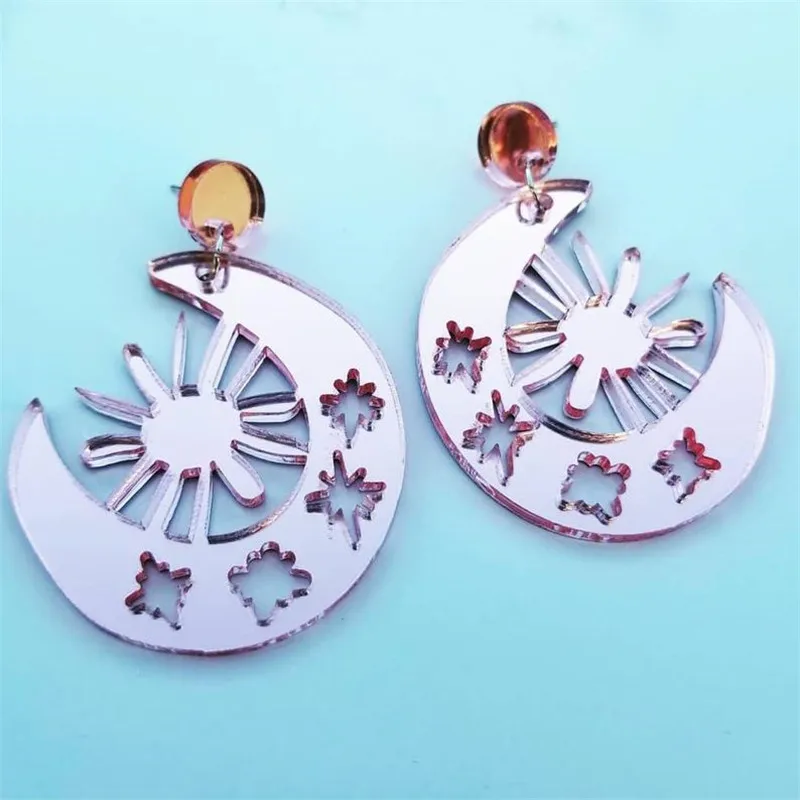 The Sun, The Moon, and All The Stars Dangle Earrings 
The Sun, The Moon, and All The Stars Dangle Earrings