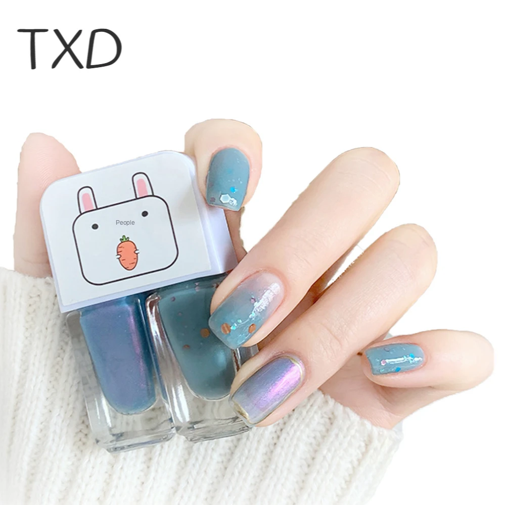 TXD 2 In 1 Set of Free Baking Glue Nail Polish Water-Based Glossy Frosting Long-Lasting Quick-Drying Peelable Nail Polish
TXD 2 In 1 Set of Free Baking Glue Nail Polish Water-Based Glossy Frosting Long-Lasting Quick-Drying Peelable Nail Polish