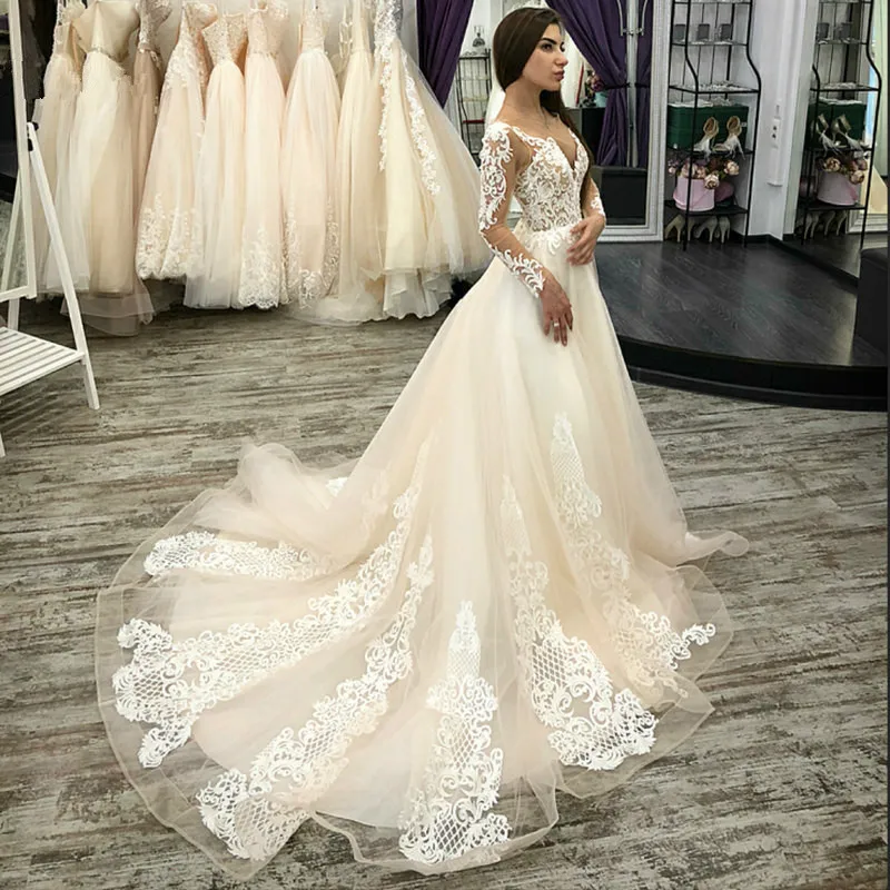 Boho Long Sleeve Wedding Dresses Champagne 2021 Top Lace Beach Wedding Dress With Sweep Train Sheer Back Princess robe de mariee
Boho Long Sleeve Wedding Dresses Champagne 2021 Top Lace Beach Wedding Dress With Sweep Train Sheer Back Princess robe de mariee