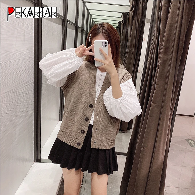 Vintage V-Neck Sleeveless Knitted Sweater Fashion Slim Pocket Button Warm Cardigan Sweater Lady Casual Loose Chic Top 2020
Vintage V-Neck Sleeveless Knitted Sweater Fashion Slim Pocket Button Warm Cardigan Sweater Lady Casual Loose Chic Top 2020