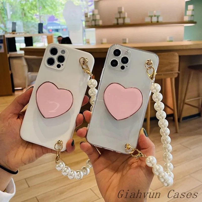 3D Heart Holder Stander Pearl Bracelet Chain Phone Case For iphone 12 Pro Max 11 6 6S 7 8 Plus X XR XS Max SE S10 S21 Cover Capa
3D Heart Holder Stander Pearl Bracelet Chain Phone Case For iphone 12 Pro Max 11 6 6S 7 8 Plus X XR XS Max SE S10 S21 Cover Capa