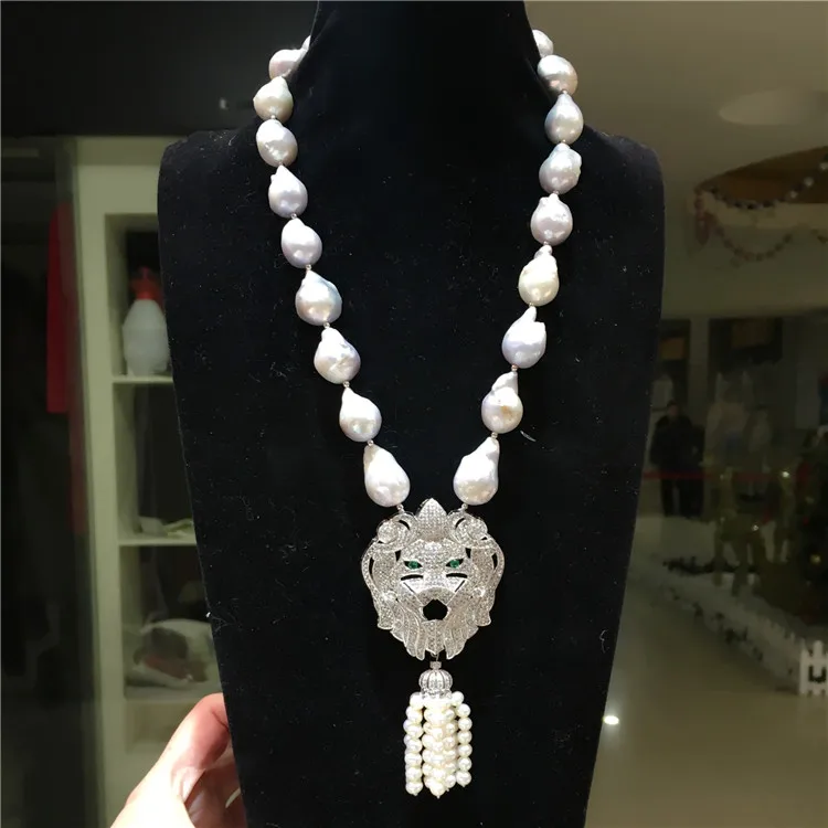 Hot sell exaggerated personality European American fashion natural white baroque pearl tassel necklace fashion jewelry
Hot sell exaggerated personality European American fashion natural white baroque pearl tassel necklace fashion jewelry