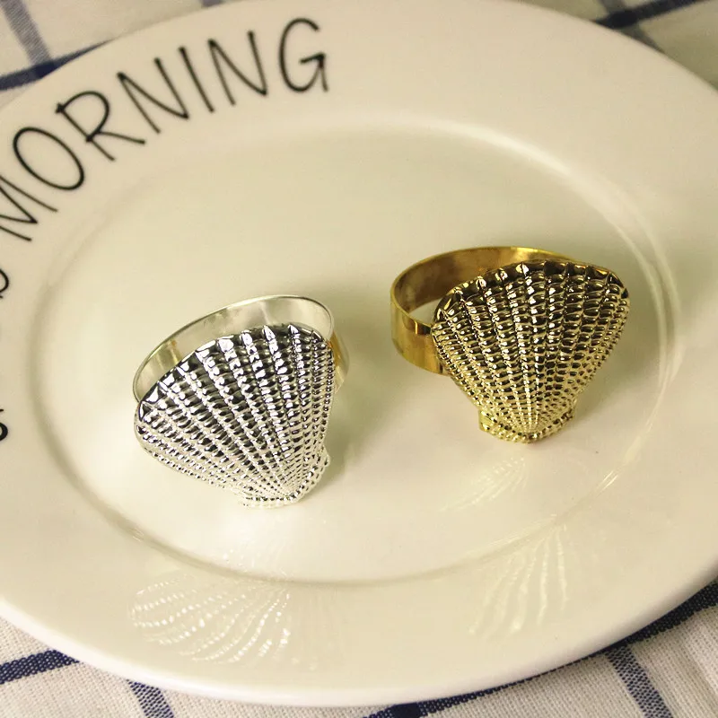 10/PCSimple modern napkin buckle Western food buckle shell shape napkin ring hotel table set cloth ring paper towel ring
10/PCSimple modern napkin buckle Western food buckle shell shape napkin ring hotel table set cloth ring paper towel ring