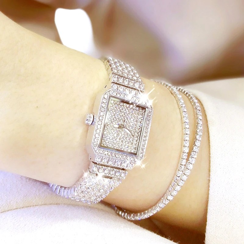 Женские кварцевые наручные часы с кристаллами серебристые
