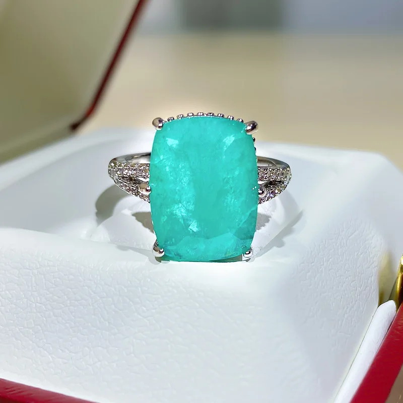 European and American index finger exaggerated ring large female gem rectangular simple inlaid gem simulation palaiba green ligh
European and American index finger exaggerated ring large female gem rectangular simple inlaid gem simulation palaiba green ligh