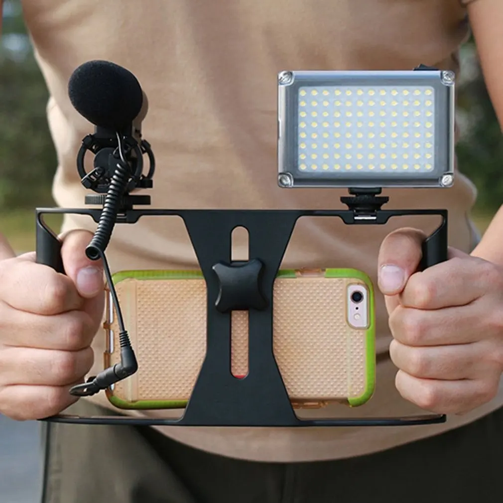 Video Camera Cage Stabilizer Film Making Rig For Smart Phone Video Rig Mobile Phone Holder Hand Grip Bracket Holder Stabilizer
Video Camera Cage Stabilizer Film Making Rig For Smart Phone Video Rig Mobile Phone Holder Hand Grip Bracket Holder Stabilizer