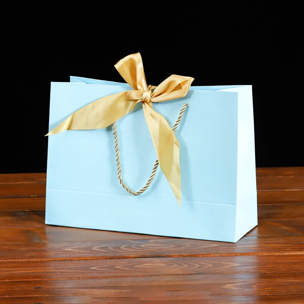 Gift Bags Packaging Handle Paper Storage Bag for Wedding Candy Favor Bag With Handle Graduation Celebration Present Wrap
Gift Bags Packaging Handle Paper Storage Bag for Wedding Candy Favor Bag With Handle Graduation Celebration Present Wrap