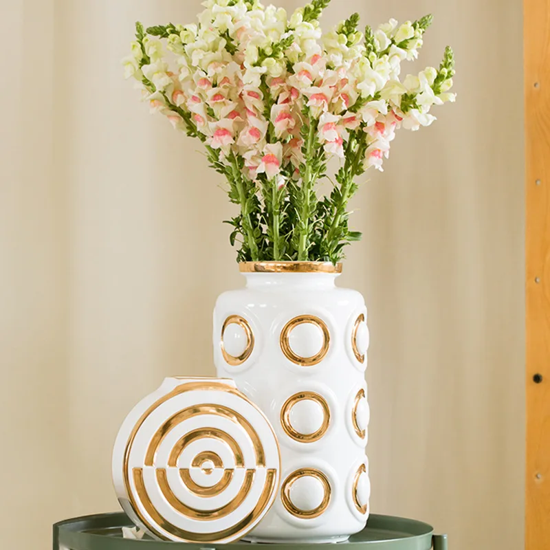 Light luxury gold edge vase small fresh and modern simple living room vase furnishing ceramic home decoration
Light luxury gold edge vase small fresh and modern simple living room vase furnishing ceramic home decoration