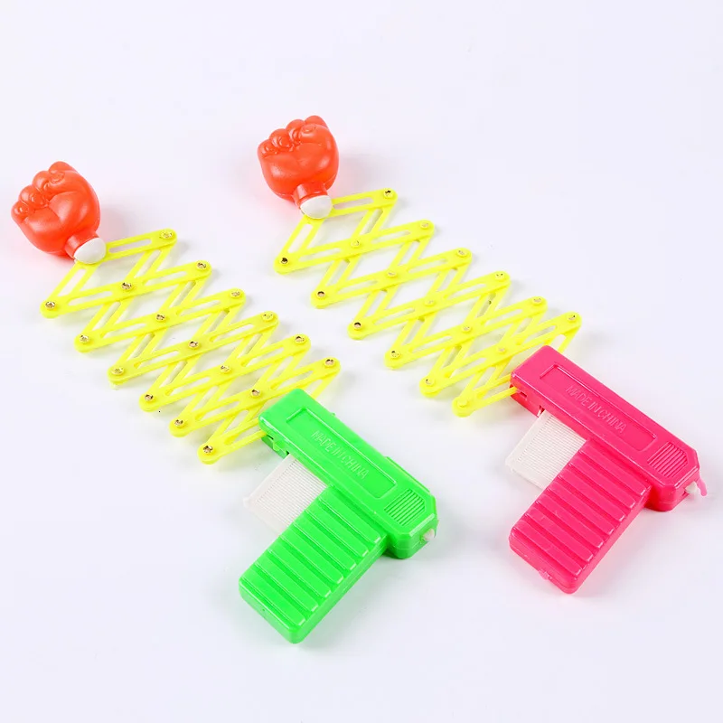 Practical Jokes Toys For Children Prank Elastic Spring Fist Weapon Funny Children Toys Plastic Gun Kids Gift
Practical Jokes Toys For Children Prank Elastic Spring Fist Weapon Funny Children Toys Plastic Gun Kids Gift