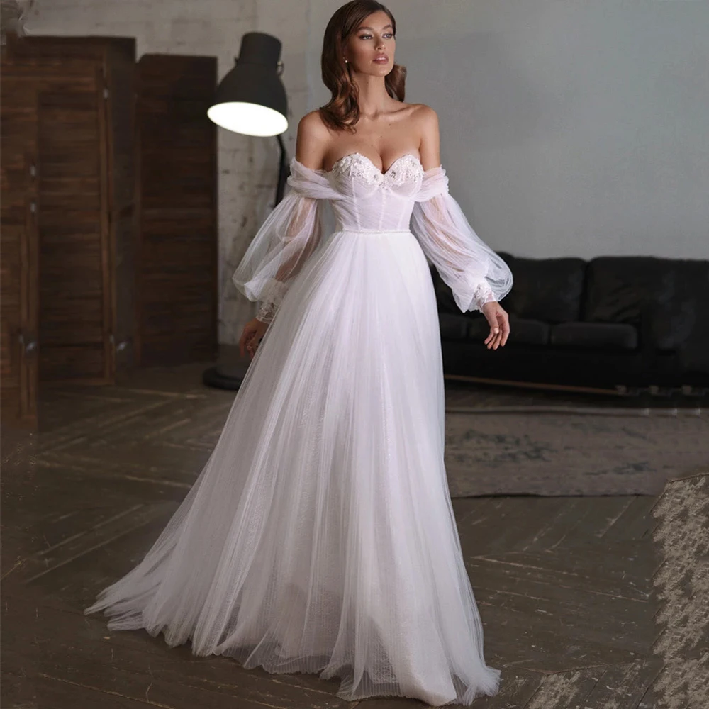 Elegant White Weddding Dresses Sexy Sweetheart Off the Shoulder Puff Sleeve Backless Tulle Beach Sweep Train A Line Bridal Gowns
Elegant White Weddding Dresses Sexy Sweetheart Off the Shoulder Puff Sleeve Backless Tulle Beach Sweep Train A Line Bridal Gowns